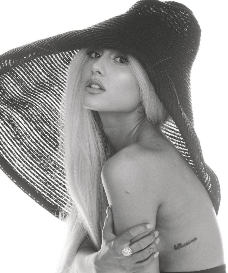 Ariana Grande Gets Topless(ish)