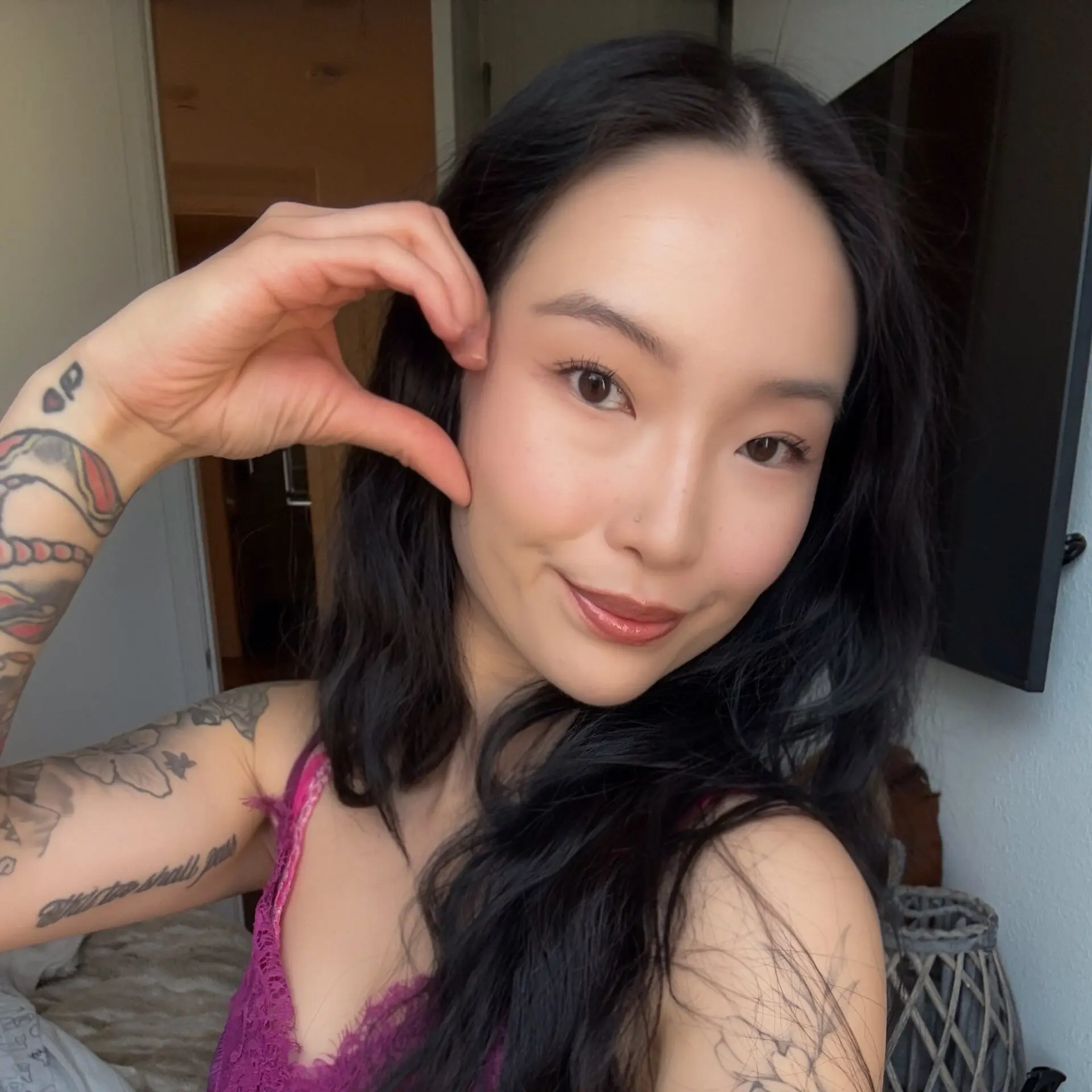 OnlyFans creator Kimi holding a seductive pose