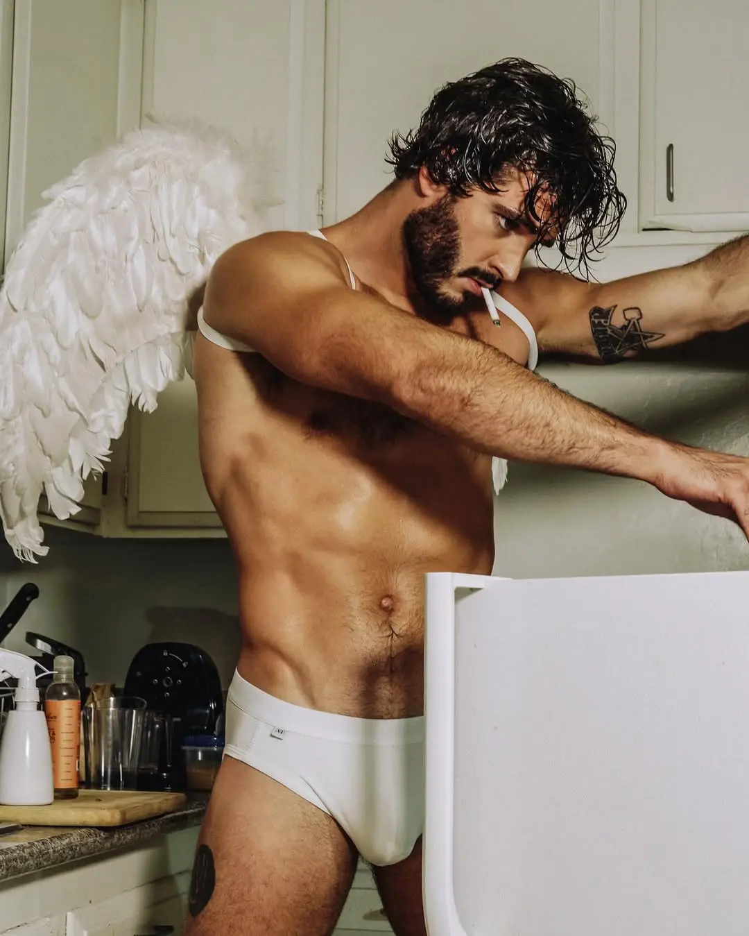 male muscle model with angel wings pic