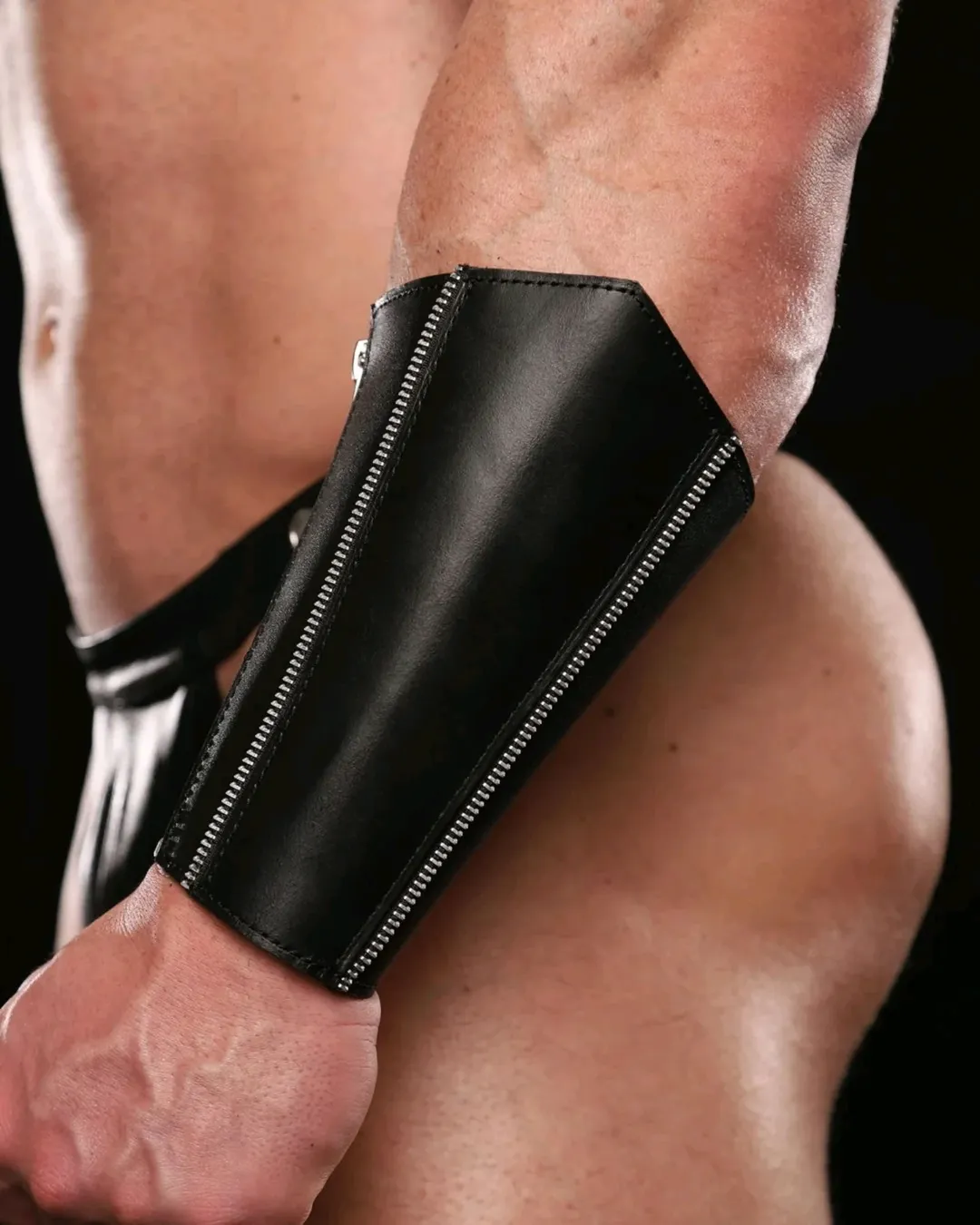 leather cuff model with bubble butt