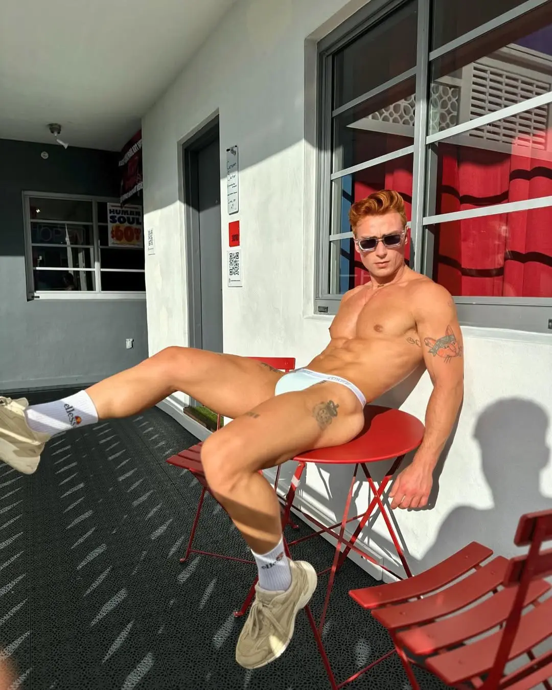 muscle guy in thong with big bulge