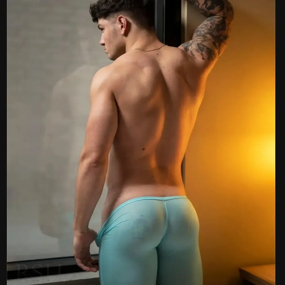 muscle model in sheer pants