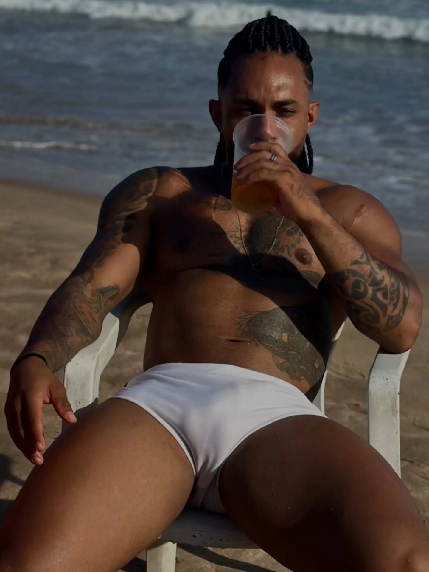 muscle model with huge package in Speedo