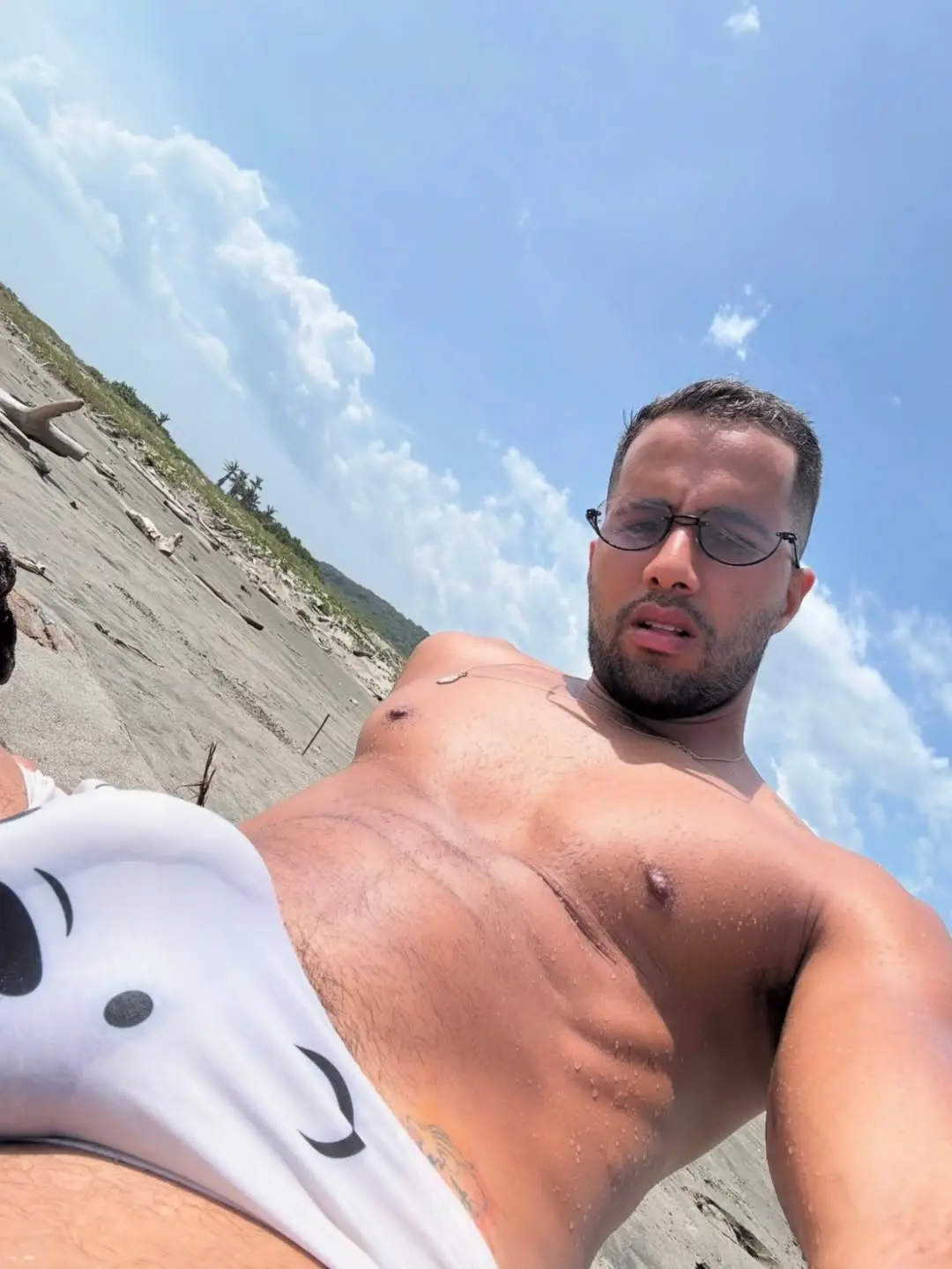hung guy in white, wet Speedo 