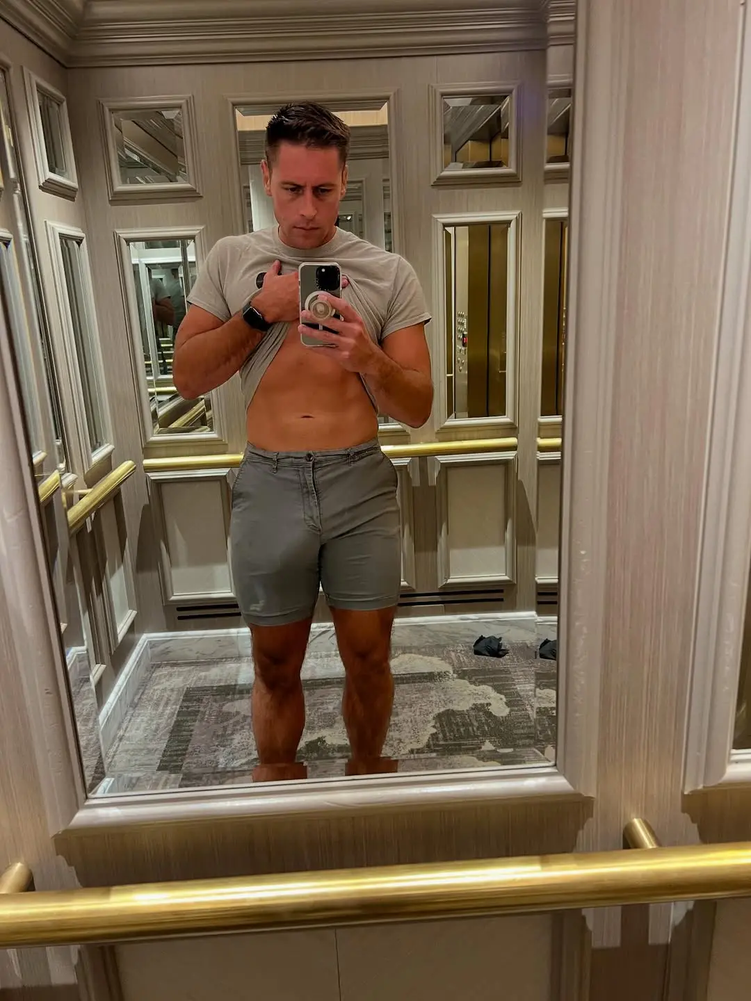 hung guy going commando in shorts