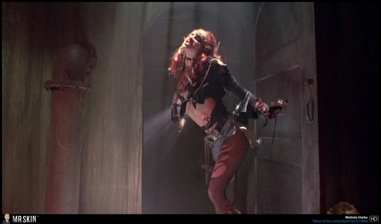 Melinda Clarke in Return of the Living Dead Part III (1993)Barbara Crampton in From Beyond (1986) Erica Durance in House of the Dead (2003) Alexis Texas in Bloodlust Zombies (2011) Linnea Quigley in The Return of the Living Dead (1985)