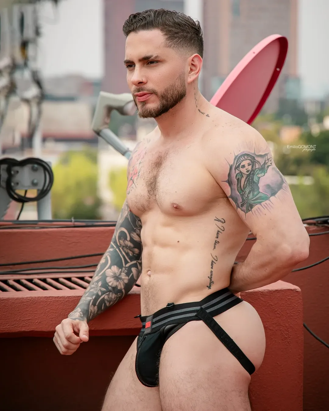 muscle stud in black jockstrap