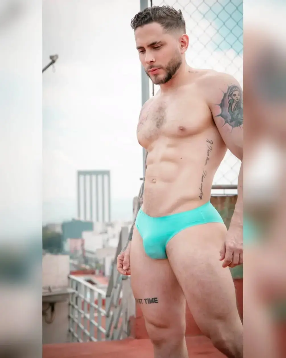 Latin guy with major bulge in a Speedo