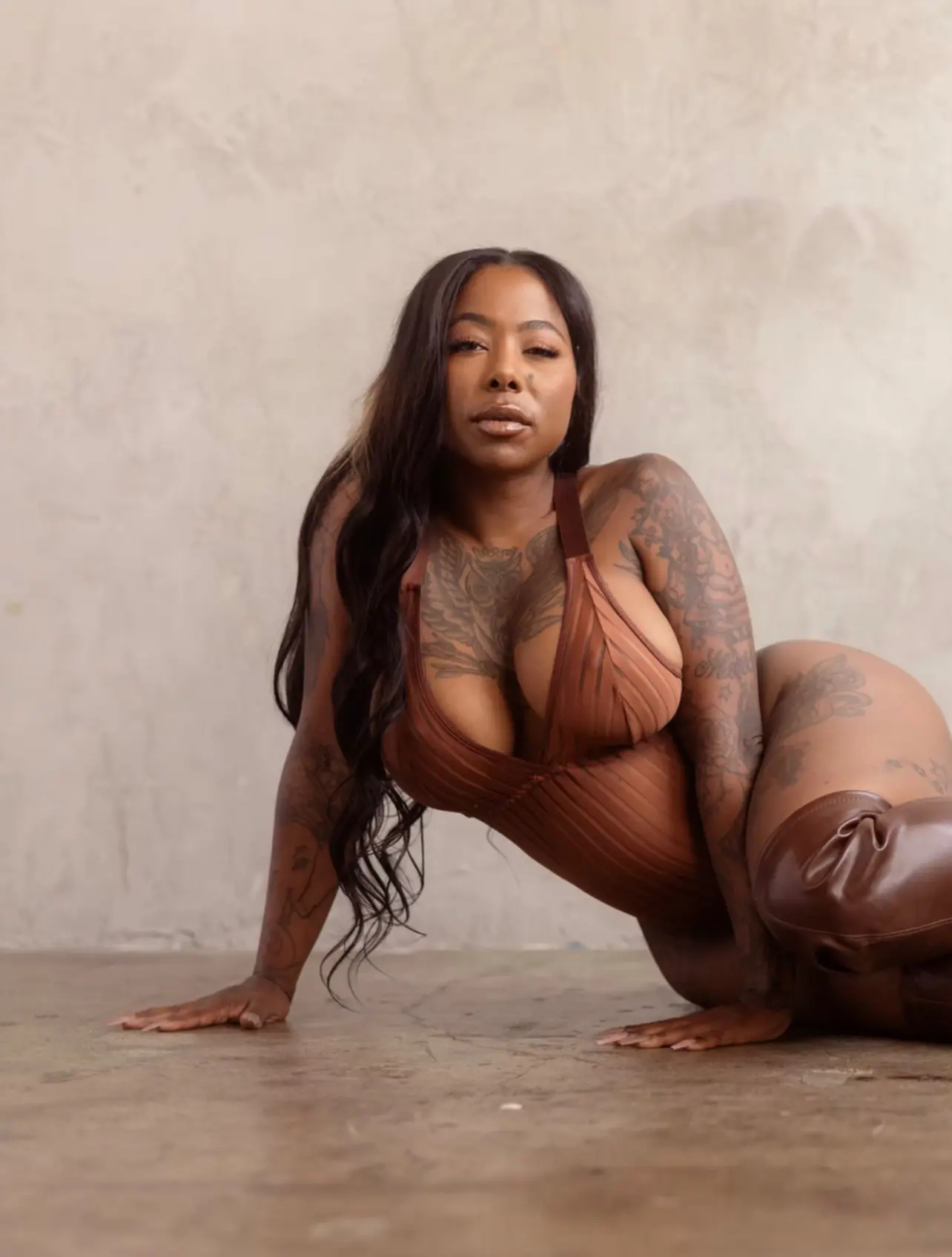 Inked MILF GoGo Zombi Nabs Two XBIZ Award Nominations