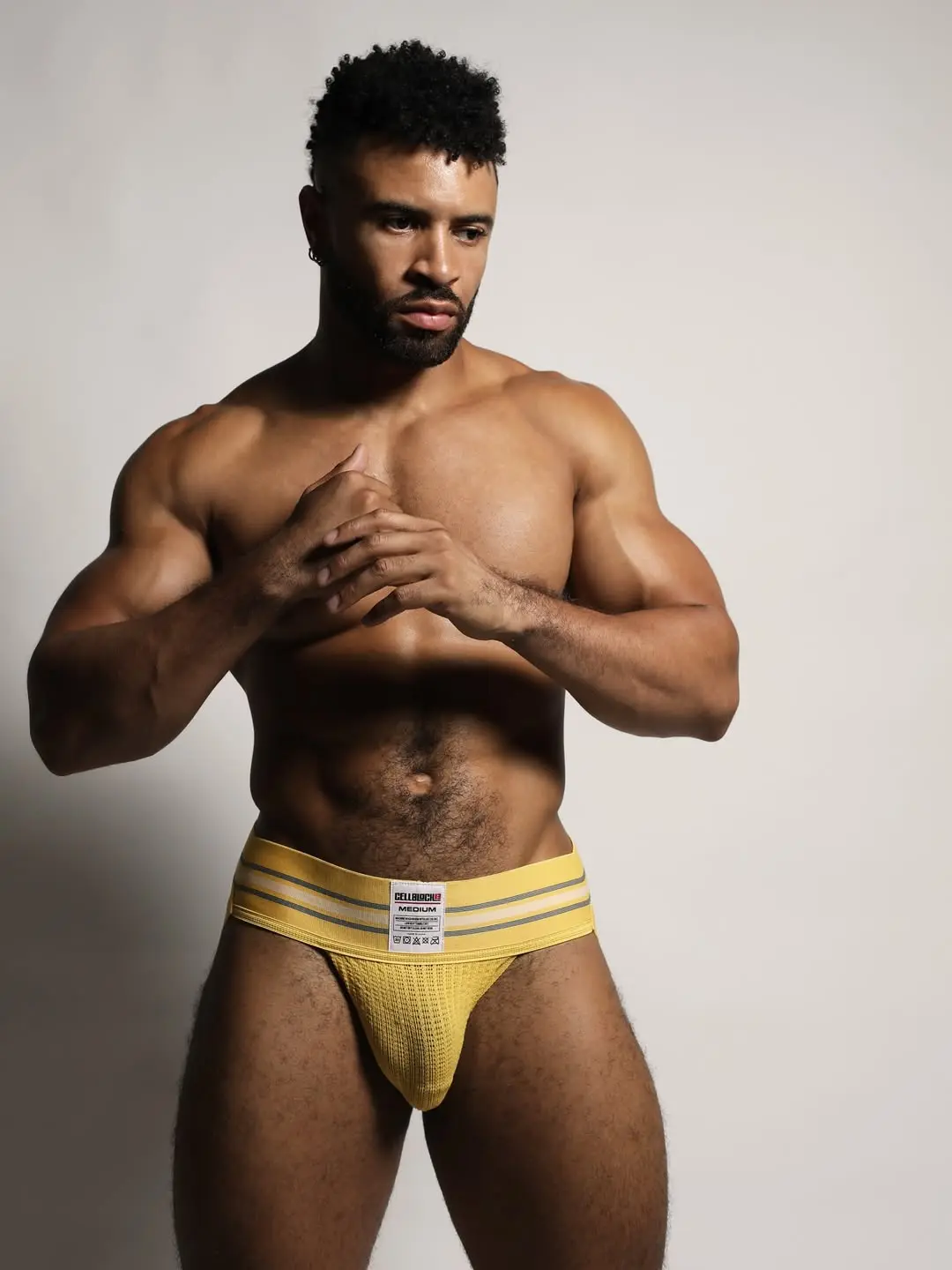 muscle model in bulging jockstrap